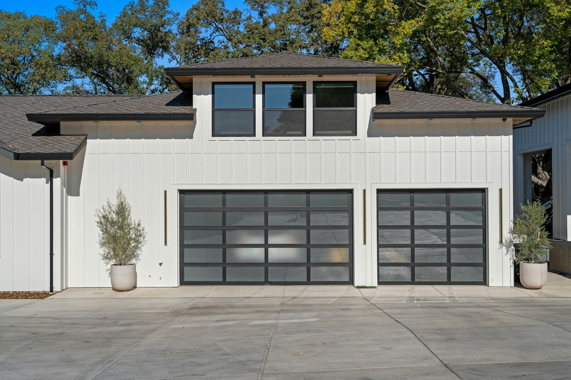 Modern home with a driveway and attached garage